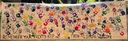 painted hand prints on fabric banner